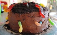 Creative cake with gummy worms.