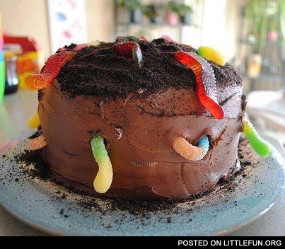 Creative cake with gummy worms.