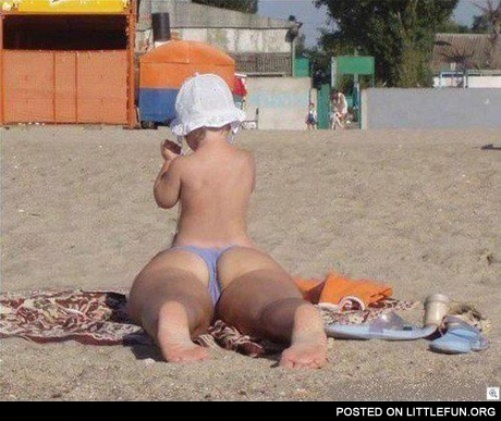 At the beach. Optical illusion.