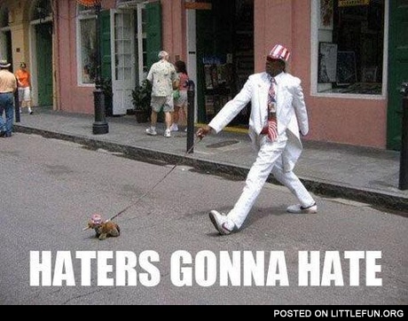 Haters gonna hate. A black man in white suit.
