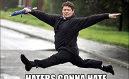 Haters gonna hate. A guy with umbrella.