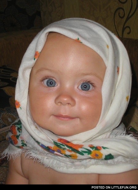 Cuteness overload. Baby in a shawl.