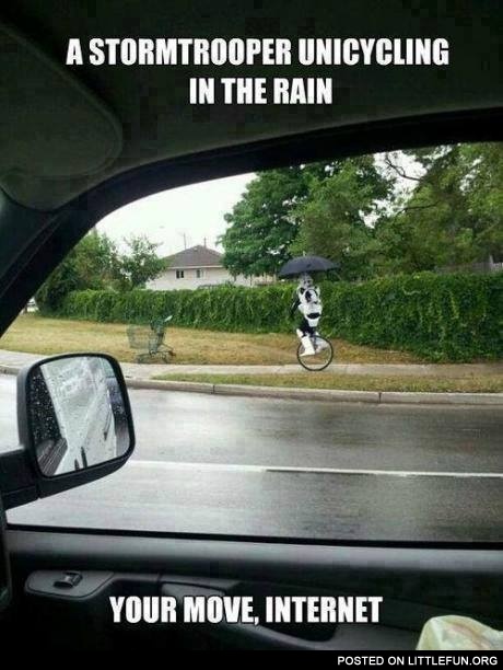 A stormtrooper unicycling in the rain