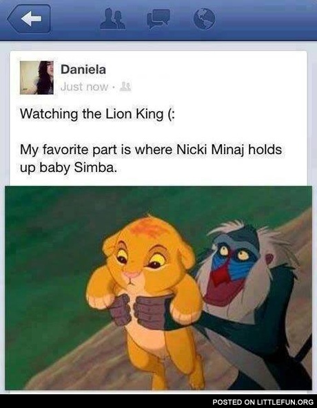 Nicki Minaj holds up baby Simba