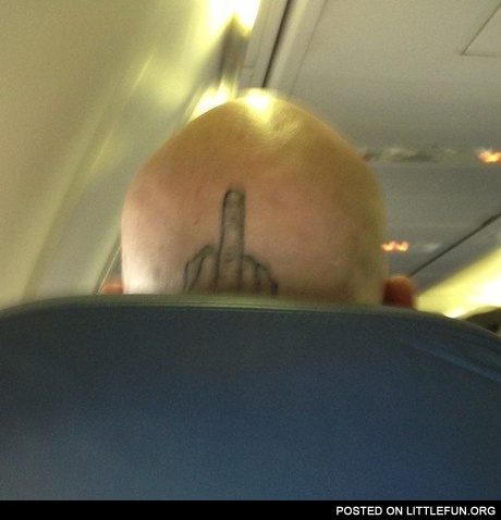 Middle finger tattoo