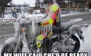 My wife said she would be ready in 5 minutes. Frozen motorcyclist.