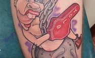 Miley Cyrus on a wrecking ball tattoo