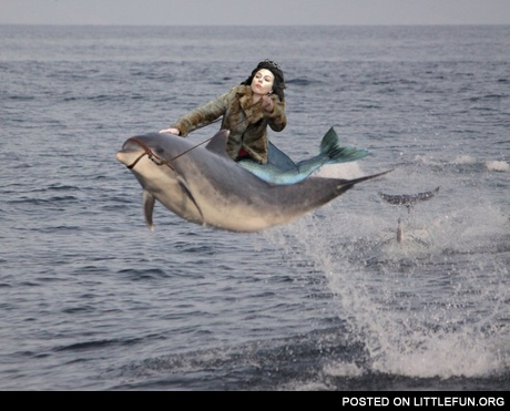  Scarlett Johansson as mermaid queen riding a dolphin