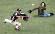 Scarlett Johansson playing baseball