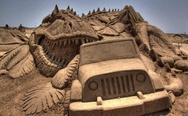 Cool dinosaur and Jeep sand sculpture