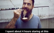 Eating noodles out of beard