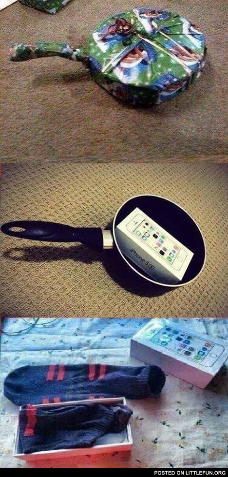 This is the evilest thing I've ever seen. Frying pan -> iPhone -> socks.